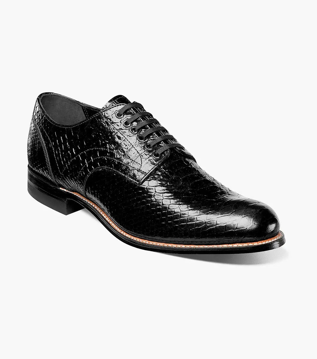 The Stacy Adams - MADISON Anaconda Plain Toe Oxford in black, designed by STACY ADAMS, is a glossy dress shoe with an anaconda print and laces, shown on a white background.