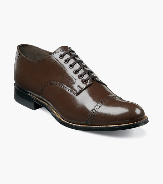 Stacy Adams - MADISON Cap Toe Oxford in luxurious brown kidskin leather, with sleek black laces, gracefully showcased on a white background.