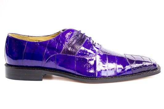 The Belvedere - Mare dress shoe in purple, crafted from luxurious genuine ostrich and eel skin, showcases a textured pattern with a sleek black sole, viewed from the side.