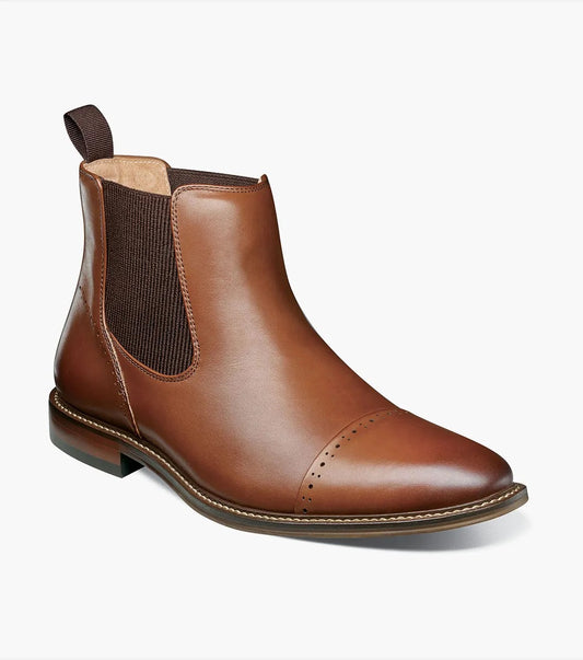 Chocolate Chelsea boot by Stacy Adams, known as the Maury Cap Toe, showcases elastic side panels for ease of wear and a RedZone Insole for enhanced comfort, featuring elegant perforated detailing on the toe.