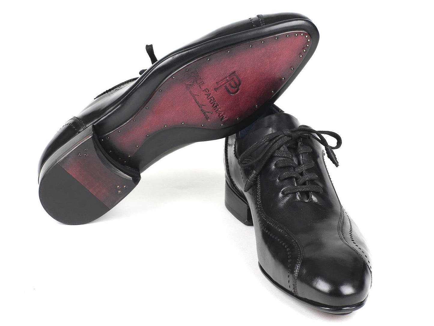 Paul Parkman presents the Handmade Lace-Up Casual Shoes in black, model 84654-BLK. These elegant shoes feature decorative perforations and are crafted from exquisite Italian calfskin, beautifully displayed on a white background.