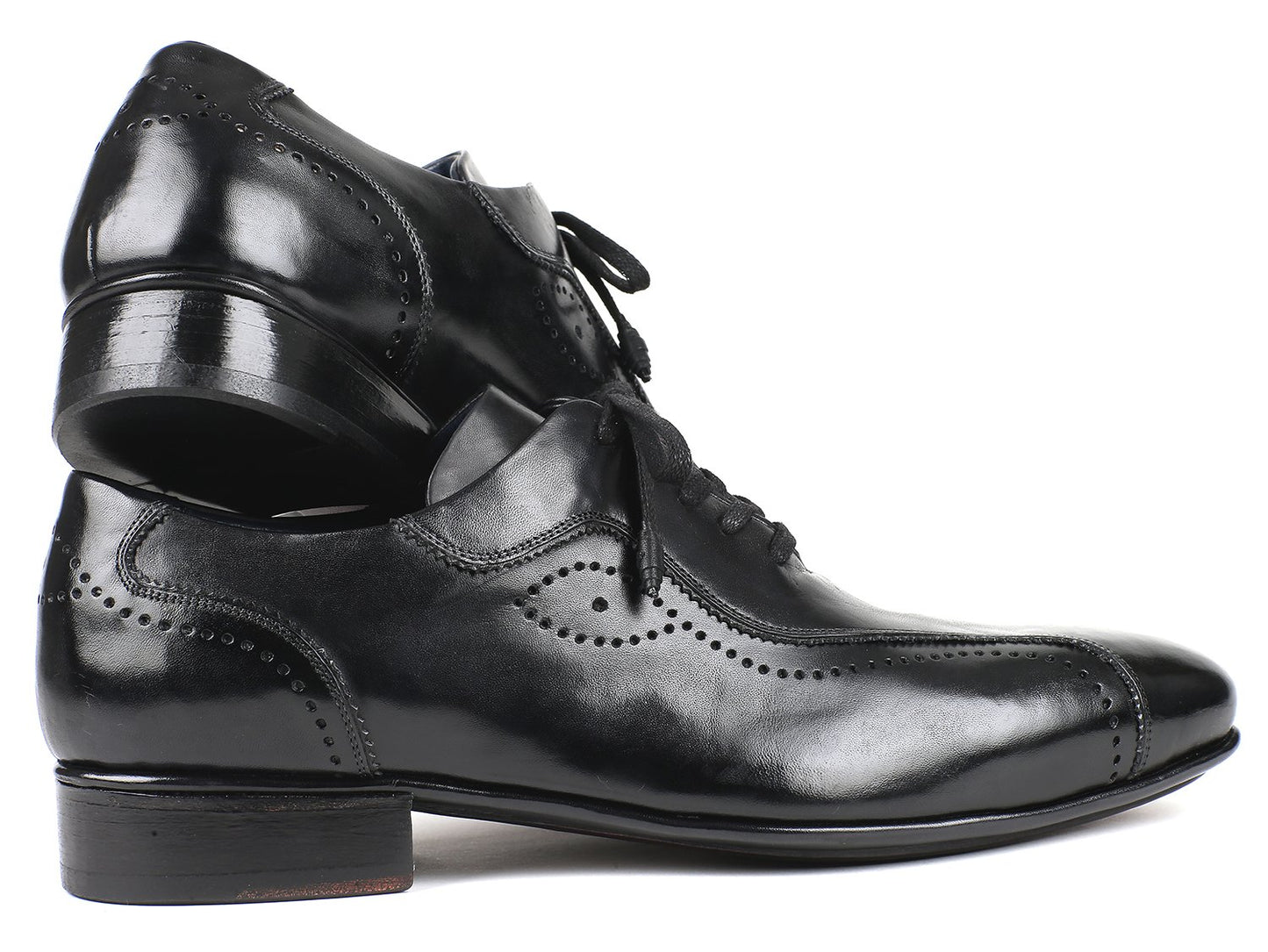 Paul Parkman presents the Handmade Lace-Up Casual Shoes in black, model 84654-BLK. These elegant shoes feature decorative perforations and are crafted from exquisite Italian calfskin, beautifully displayed on a white background.