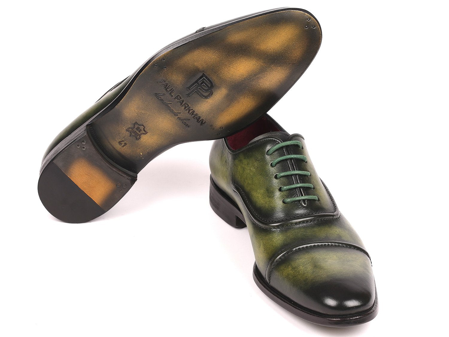 The Paul Parkman Captoe Oxfords Green - 077-GRN are expertly crafted men's shoes made-to-order, highlighting a striking green leather design with cap toes and matching green laces. These shoes feature the finest hand-painted leather for a distinctive touch, brought to you by the renowned brand, Paul Parkman.