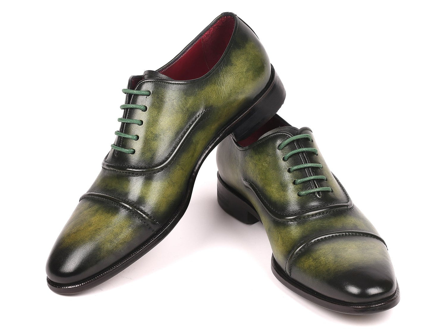 The Paul Parkman Captoe Oxfords Green - 077-GRN are expertly crafted men's shoes made-to-order, highlighting a striking green leather design with cap toes and matching green laces. These shoes feature the finest hand-painted leather for a distinctive touch, brought to you by the renowned brand, Paul Parkman.