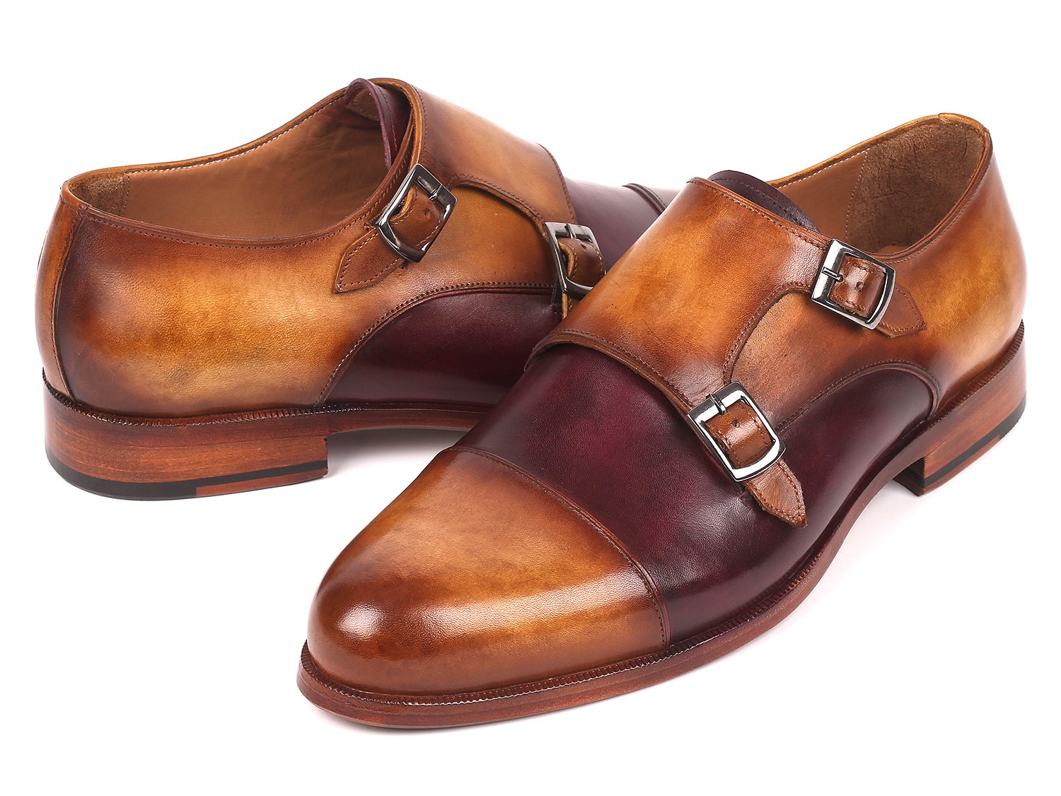 The Paul Parkman Captoe Double Monkstraps Brown & Purple - 045BP17 shoes feature hand-painted leather in luxurious brown and purple shades, crafted from premium Italian calfskin. These elegant double monk straps embody a perfect fusion of style and sophistication.