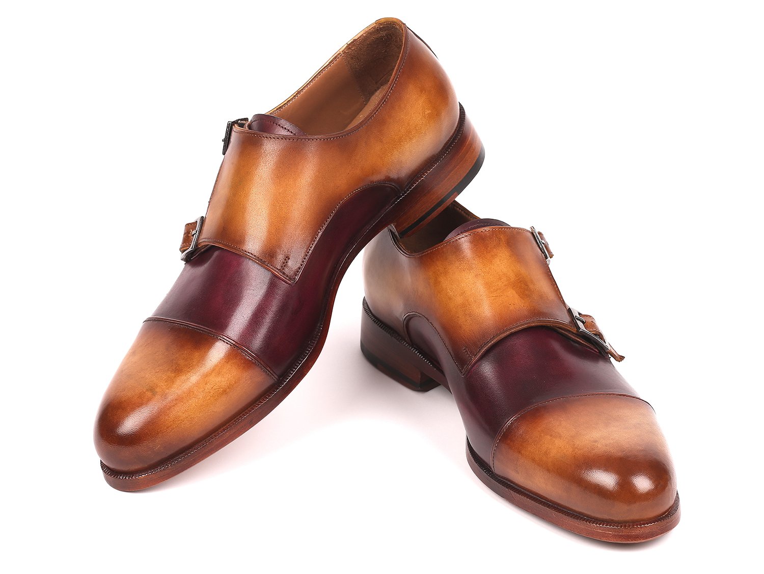 The Paul Parkman Captoe Double Monkstraps Brown & Purple - 045BP17 shoes feature hand-painted leather in luxurious brown and purple shades, crafted from premium Italian calfskin. These elegant double monk straps embody a perfect fusion of style and sophistication.