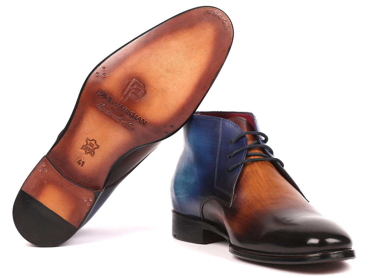 The Paul Parkman Chukka Boots Brown & Blue - CK67L6 are hand-painted calfskin leather boots that showcase a two-tone design with a striking blue and brown gradient, complete with black laces and a slight heel.