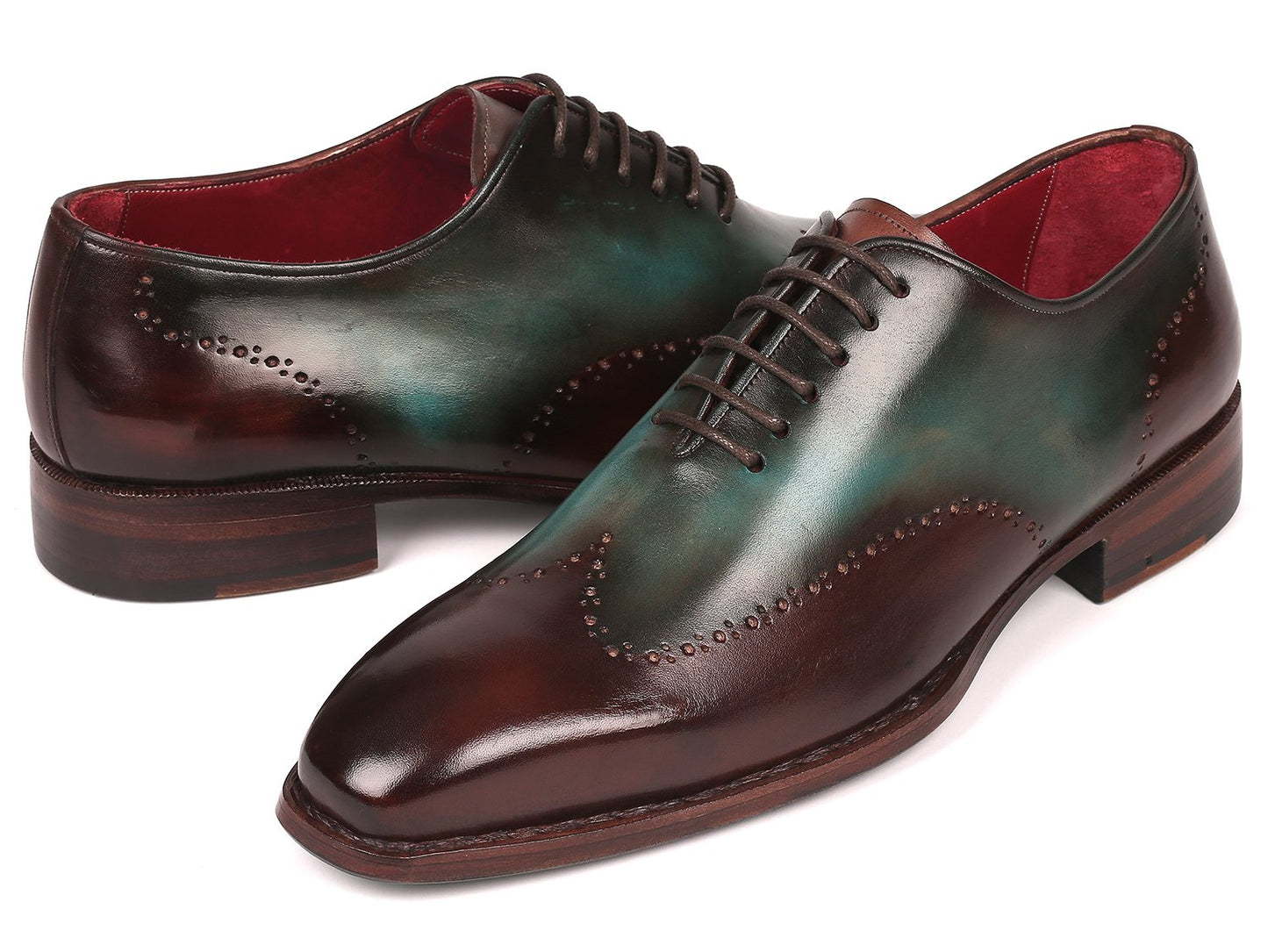 Experience the Paul Parkman Goodyear Welted Wingtip Oxfords in Brown & Turquoise (081-BTQ), featuring polished leather with decorative perforations and a vibrant red interior lining. These brogues combine durability and style with their classic Goodyear welted construction.