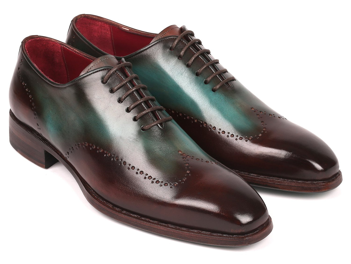 Experience the Paul Parkman Goodyear Welted Wingtip Oxfords in Brown & Turquoise (081-BTQ), featuring polished leather with decorative perforations and a vibrant red interior lining. These brogues combine durability and style with their classic Goodyear welted construction.