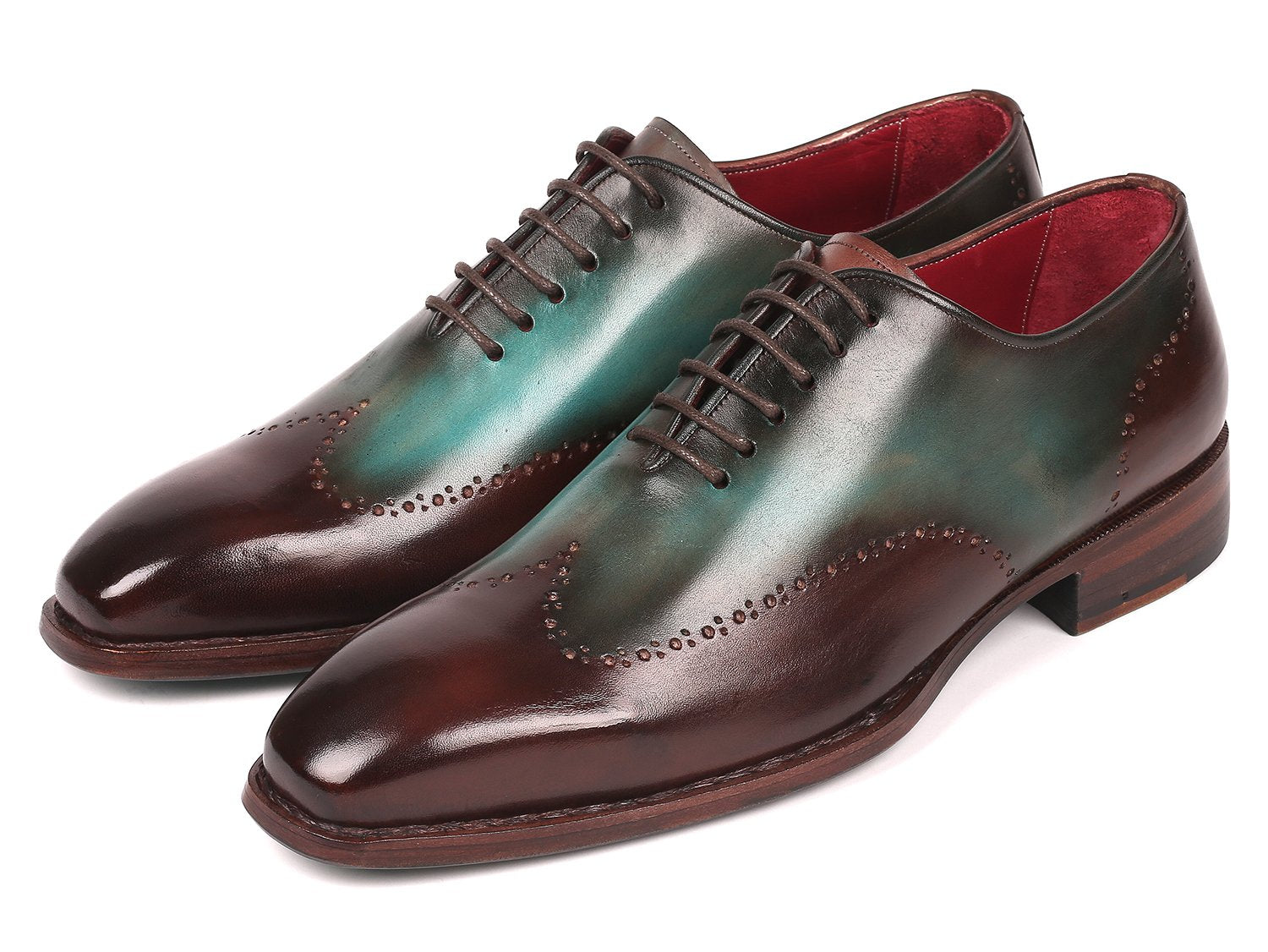 Experience the Paul Parkman Goodyear Welted Wingtip Oxfords in Brown & Turquoise (081-BTQ), featuring polished leather with decorative perforations and a vibrant red interior lining. These brogues combine durability and style with their classic Goodyear welted construction.