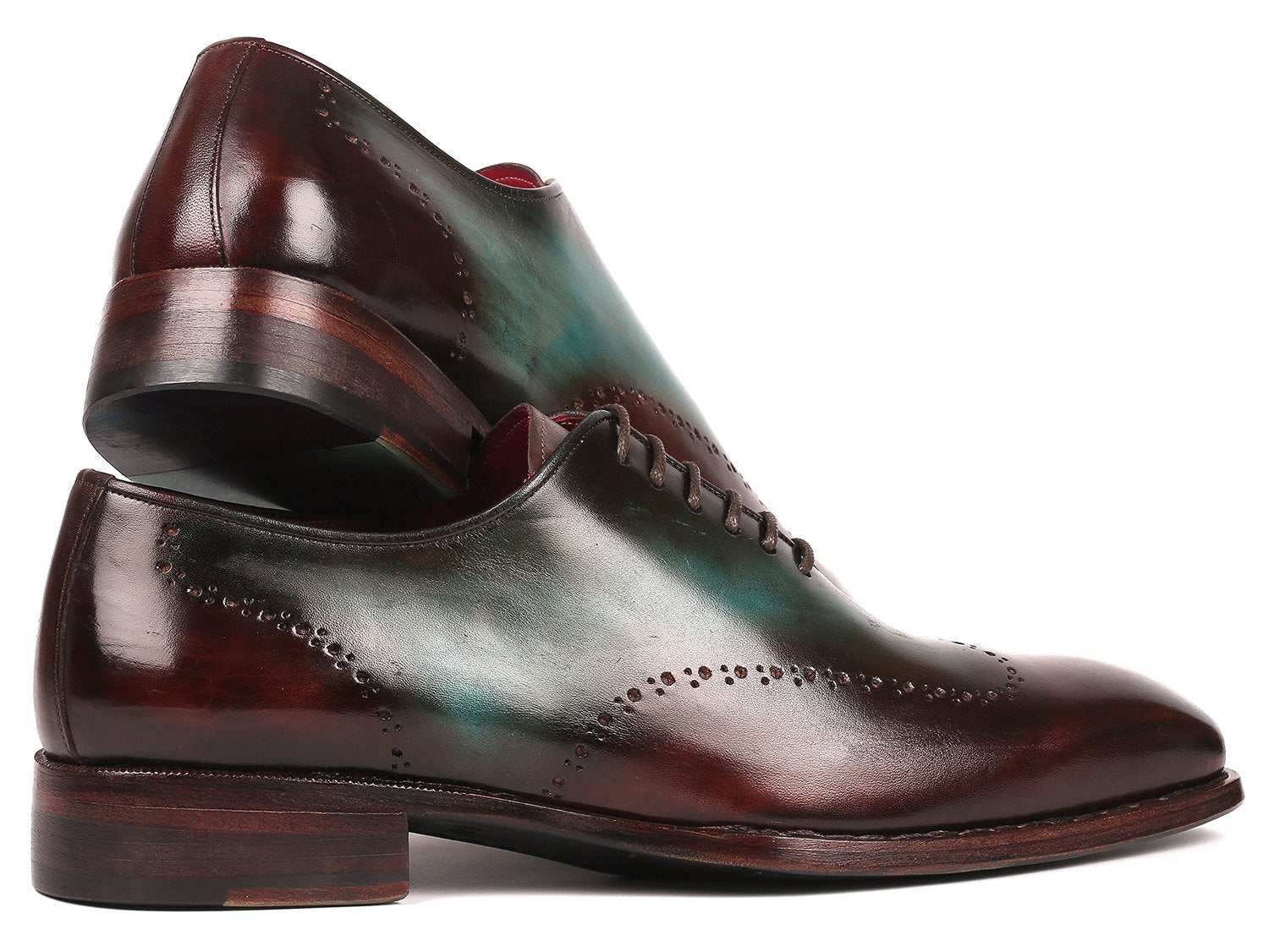 Experience the Paul Parkman Goodyear Welted Wingtip Oxfords in Brown & Turquoise (081-BTQ), featuring polished leather with decorative perforations and a vibrant red interior lining. These brogues combine durability and style with their classic Goodyear welted construction.