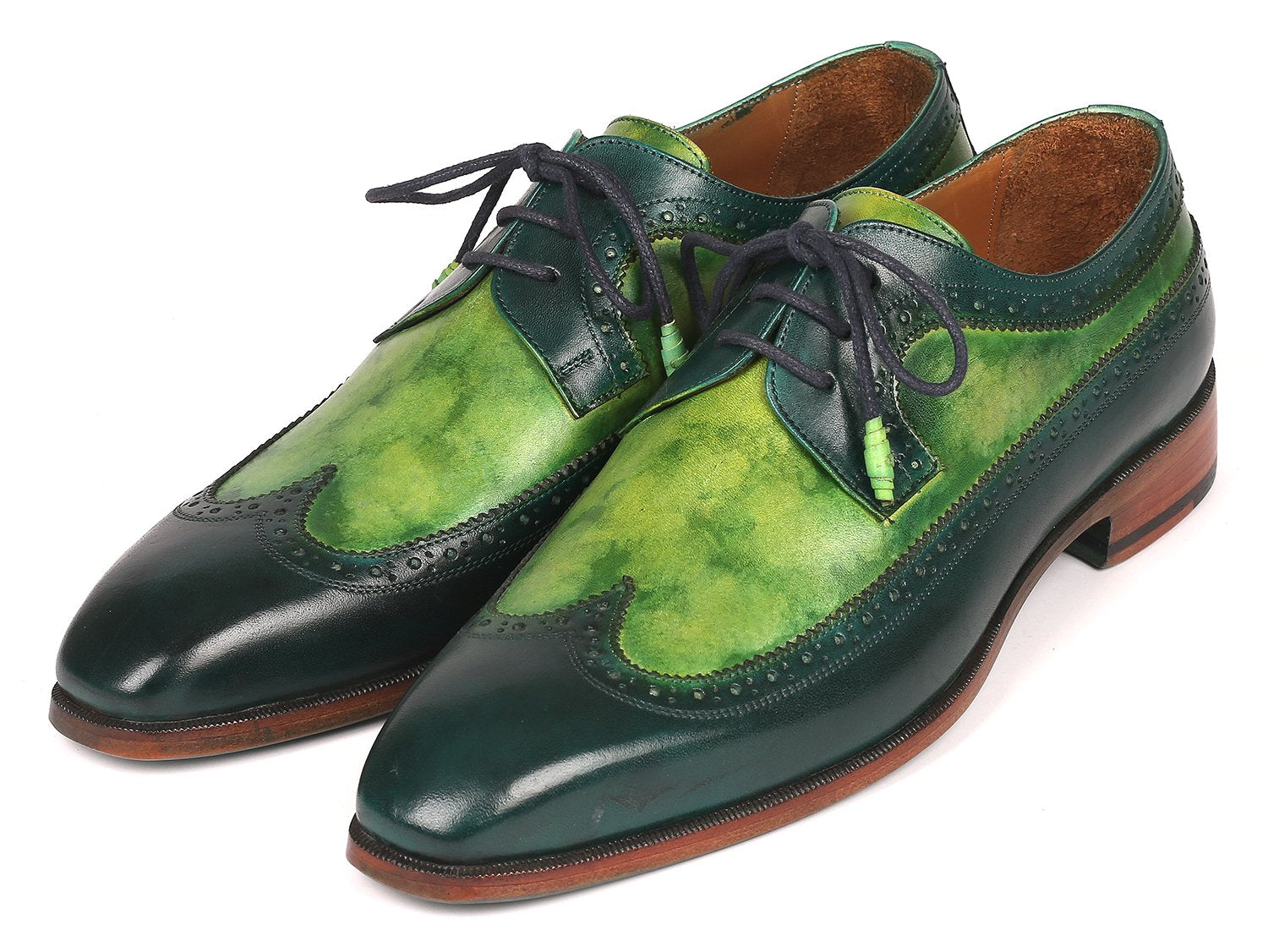 The Paul Parkman Green Dual Tone Wingtip Derby Shoes - 6931GRN is an elegant pair of shoes crafted from exquisite hand-painted calfskin, featuring a sophisticated green and black leather design with contrasting black laces and brown soles for a unique touch.