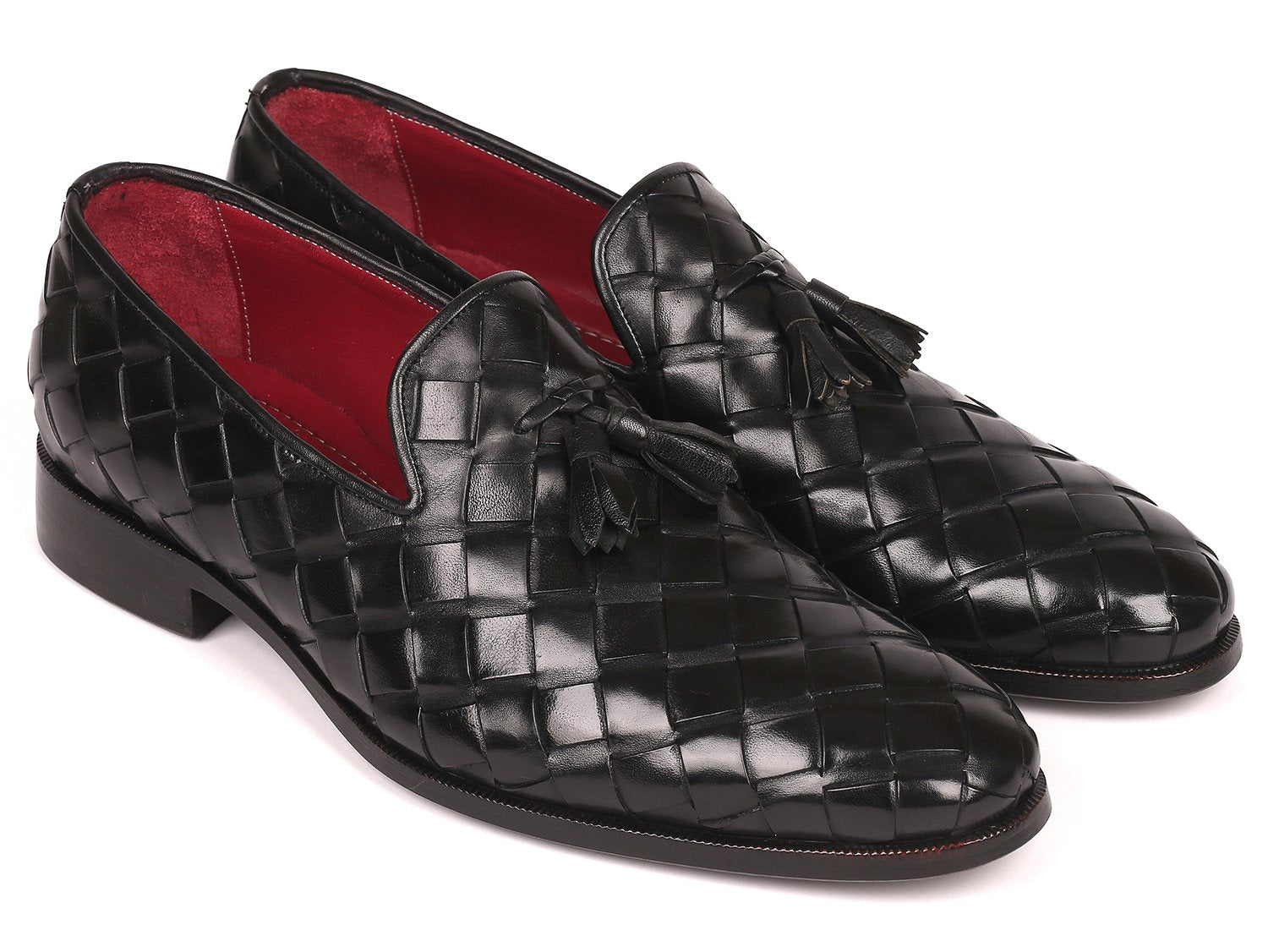 Discover the Paul Parkman Big Braided Tassel Loafers in Black - 6623-BLK, a pair of elegant black loafers featuring a striking red interior lining. These bespoke shoes represent unmatched luxury, combining classic design with customized craftsmanship from the renowned brand Paul Parkman.