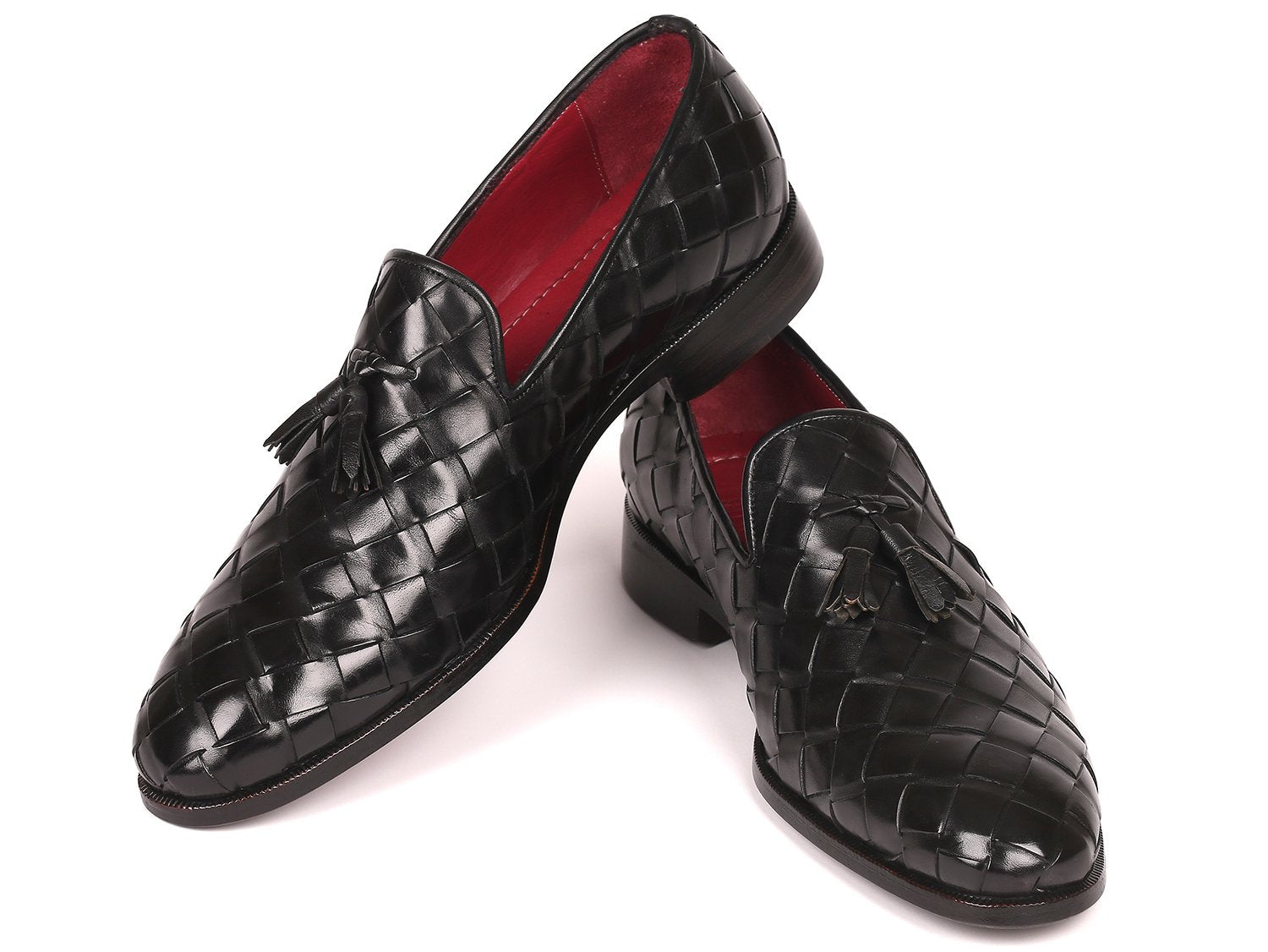 Discover the Paul Parkman Big Braided Tassel Loafers in Black - 6623-BLK, a pair of elegant black loafers featuring a striking red interior lining. These bespoke shoes represent unmatched luxury, combining classic design with customized craftsmanship from the renowned brand Paul Parkman.