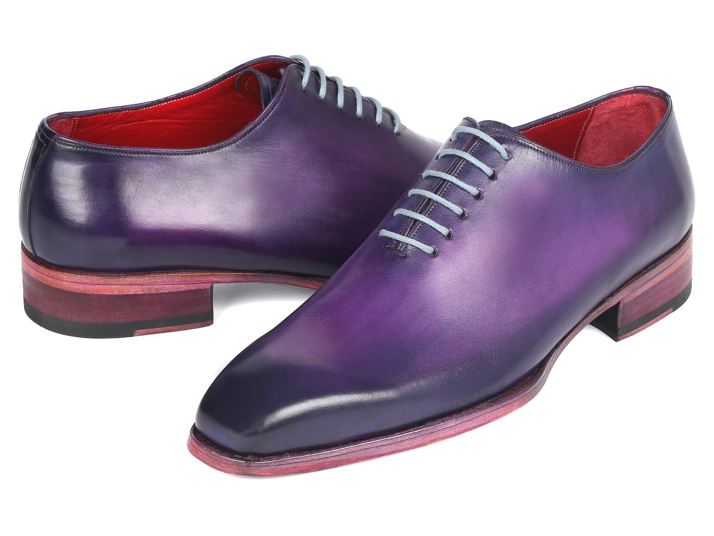 The Paul Parkman Goodyear Welted Wholecut Oxfords in a purple hand-painted design feature light grey laces and a red interior, presented at an angle on a white background. These shoes exemplify meticulous detail and superior craftsmanship.