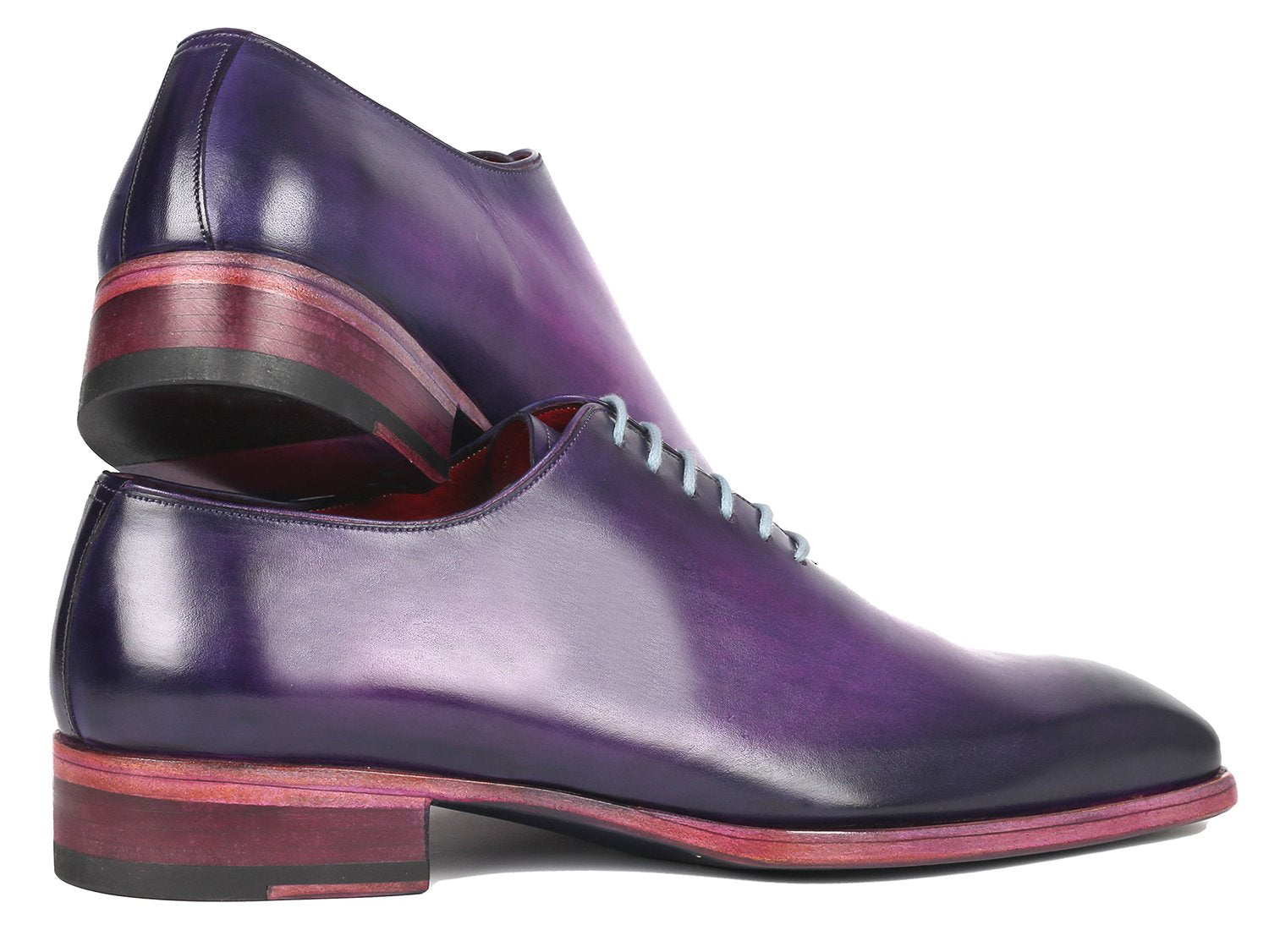 The Paul Parkman Goodyear Welted Wholecut Oxfords in a purple hand-painted design feature light grey laces and a red interior, presented at an angle on a white background. These shoes exemplify meticulous detail and superior craftsmanship.