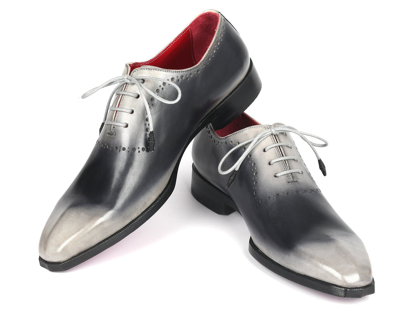 Introducing the Paul Parkman Gray Hand-Painted Oxfords - AG445GRY: a pair of glossy, hand-painted leather dress shoes crafted by Paul Parkman. These shoes feature a stunning gradient of gray and black with striking white laces and a vibrant red interior. Made-to-order with an exclusive hue, they make a statement in any formal setting.