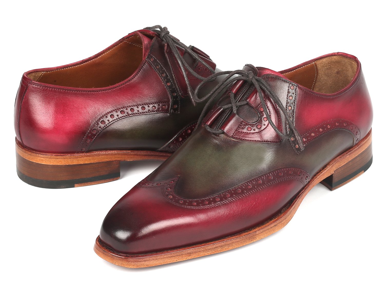 Introducing the Paul Parkman Goodyear Welted Ghillie Lacing Brogues in Green & Bordeaux (2955-GRB), a stunning pair of shoes crafted from hand-painted leather with intricate wingtip brogue detailing. These elegant shoes feature brown soles and black laces, and are expertly constructed using Goodyear welt techniques for unmatched craftsmanship.