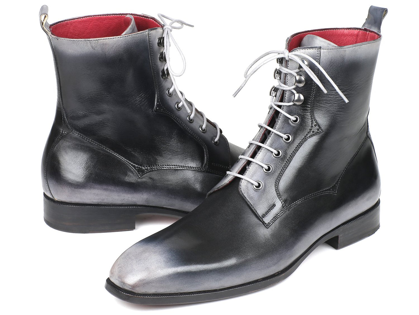 A pair of Paul Parkman Gray Burnished Leather Lace-Up Boots (BT535-GRY), featuring black leather with gray tips and white laces, displayed on a white background.