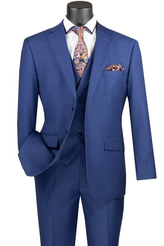 The Vinci Suits' Modern Fit 3 Piece Single Breasted Suit (Blue) MV2TR showcases a sophisticated design with its wool-feel fabric and is complemented by a patterned tie and matching pocket square, elegantly displayed on a mannequin.