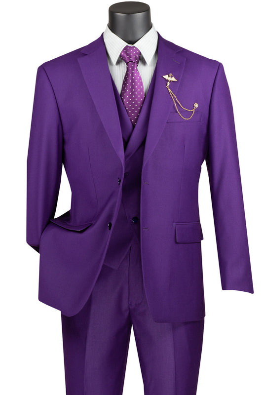 Introducing the Vinci Modern Fit 3 Piece Single Breasted Suit (Purple) MV2TR by Vinci Suits, this sophisticated set showcases a stylish modern fit in a vibrant purple shade. Complete with a white shirt and a purple polka dot tie, it is elegantly complemented by a gold lapel chain. The ensemble offers an exquisite wool-like feel, ensuring both comfort and elegance.