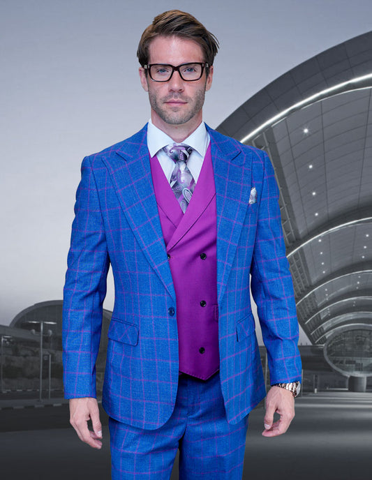 A man in the OXFORD-SAPPHIRE suit by Statement Clothing, tailored in a modern fit with Italian wool, paired with a purple vest and tie stands in front of a sleek, curved building.