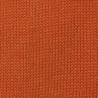 Inserch's cotton blend turtleneck sweaters, part of the 4708 collection featuring ten color options, are elegantly displayed. The vibrant orange, white, and green variations rest on a wooden chair with a patterned cushion, while other regular fit options in red, blue, and black are arranged gracefully on the ground below.