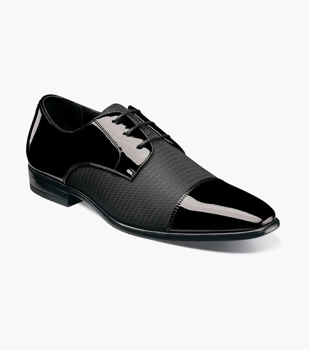 Introducing the Stacy Adams - PHARAOH Cap Toe Oxford in black, a striking formal dress shoe made with polished patent leather and a textured fabric upper. Its lace-up style guarantees an elegant appearance for any event.