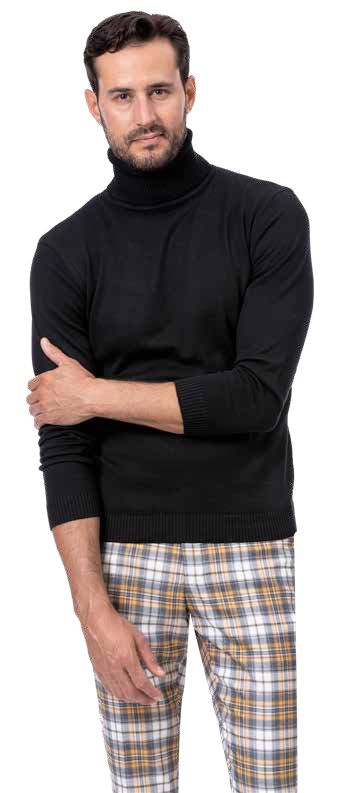 A man stands confidently, showcasing his modern fit with one arm crossed over his chest, wearing a black turtleneck sweater and the stylish EJ Samuel Charc/Gold Plaid Pants PL108 from EJ SAMUEL.