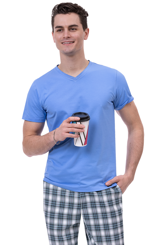 A person wearing EJ Samuel Green/White Plaid Pants PL95 smiles while holding a takeaway coffee cup.