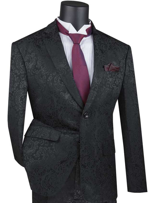 A mannequin is styled in a Vinci Slim Fit 2 Piece Single Breasted Suit, colored black, from the Vinci Suits collection. The ensemble showcases a sleek design with a premium wool texture, incorporating a classic 2-button jacket. It is complemented by a pristine white dress shirt and an elegant burgundy tie.