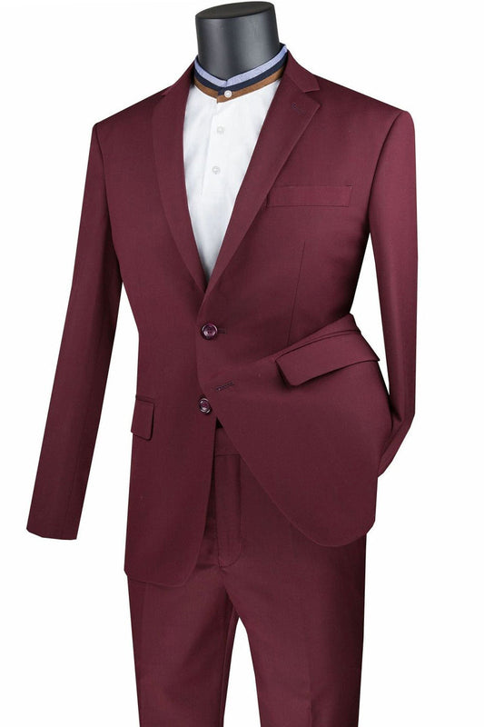 A burgundy Vinci Slim Fit 2 Piece 2 Button Suit (SC900-12), complemented by a white shirt, elegantly drapes over a black mannequin head.