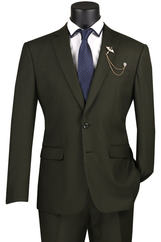 A mannequin presents the Vinci Slim Fit 2 Piece 2 Button Suit in dark olive green, paired with a blue tie for an effortlessly wrinkle-resistant look. This sleek suit by Vinci Suits is elegantly enhanced with a pin and chains on the left lapel.