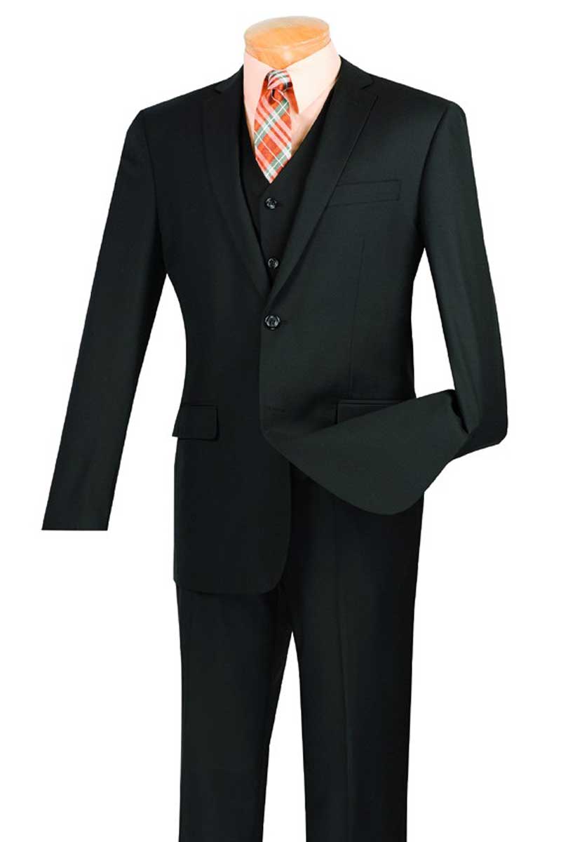 The Vinci Suits black Slim Fit 3 Piece 2 Button Suit, SV2900, paired with a peach shirt and plaid tie on a mannequin, showcases the refined elegance of wrinkle-resistant tailoring.