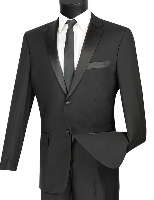 The mannequin is adorned with a stylish black Vinci Slim Fit 2 Piece 2 Buttons Design Tuxedo (T-SC900), featuring a satin shawl collar. Accompanied by a matching tie and a pristine white dress shirt, this elegant ensemble from Vinci Suits offers wrinkle resistance, ensuring you look flawless at any occasion.