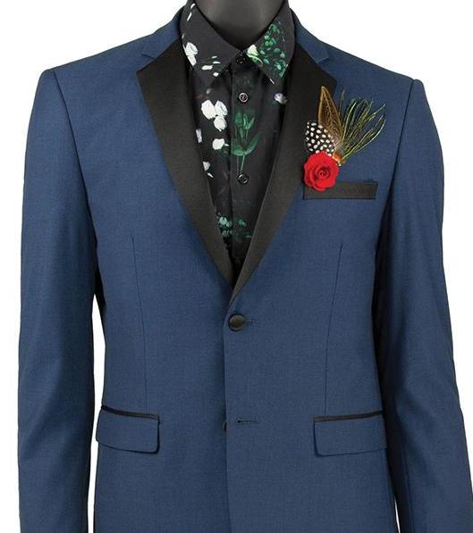 Mannequin dressed in a Vinci Suits Ultra Slim Fit 2 Button 2 Piece Tuxedo in blue, featuring a black floral shirt, adorned with a red rose and feather boutonniere.