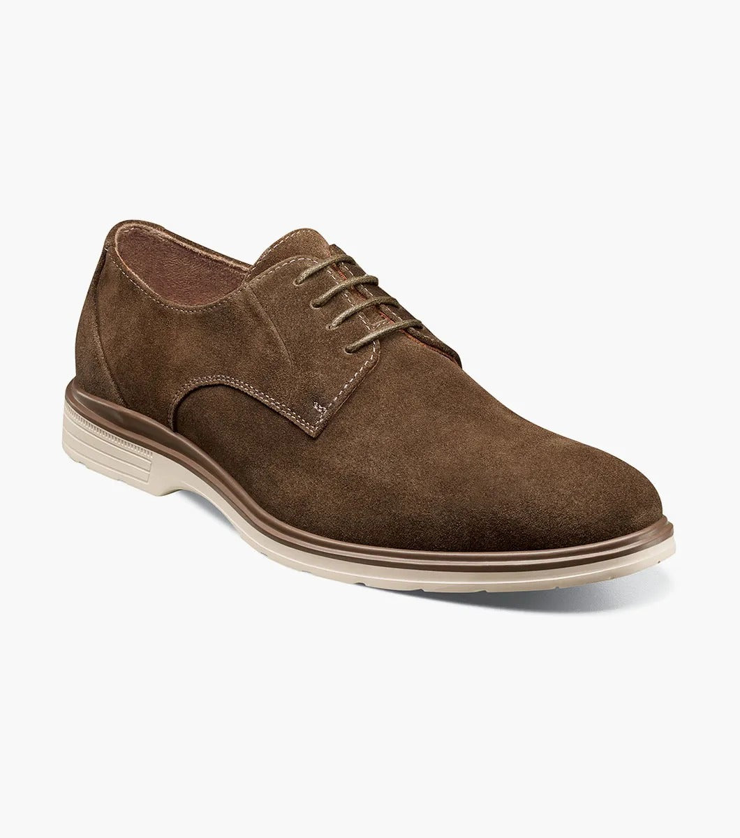 Product: STACY ADAMS presents the TAYSON Plain Toe Lace Up, model 25522-245, featuring a brown suede exterior with a light beige sole and anatomical arch support. This shoe offers a round toe design and laced closure for added comfort and style.