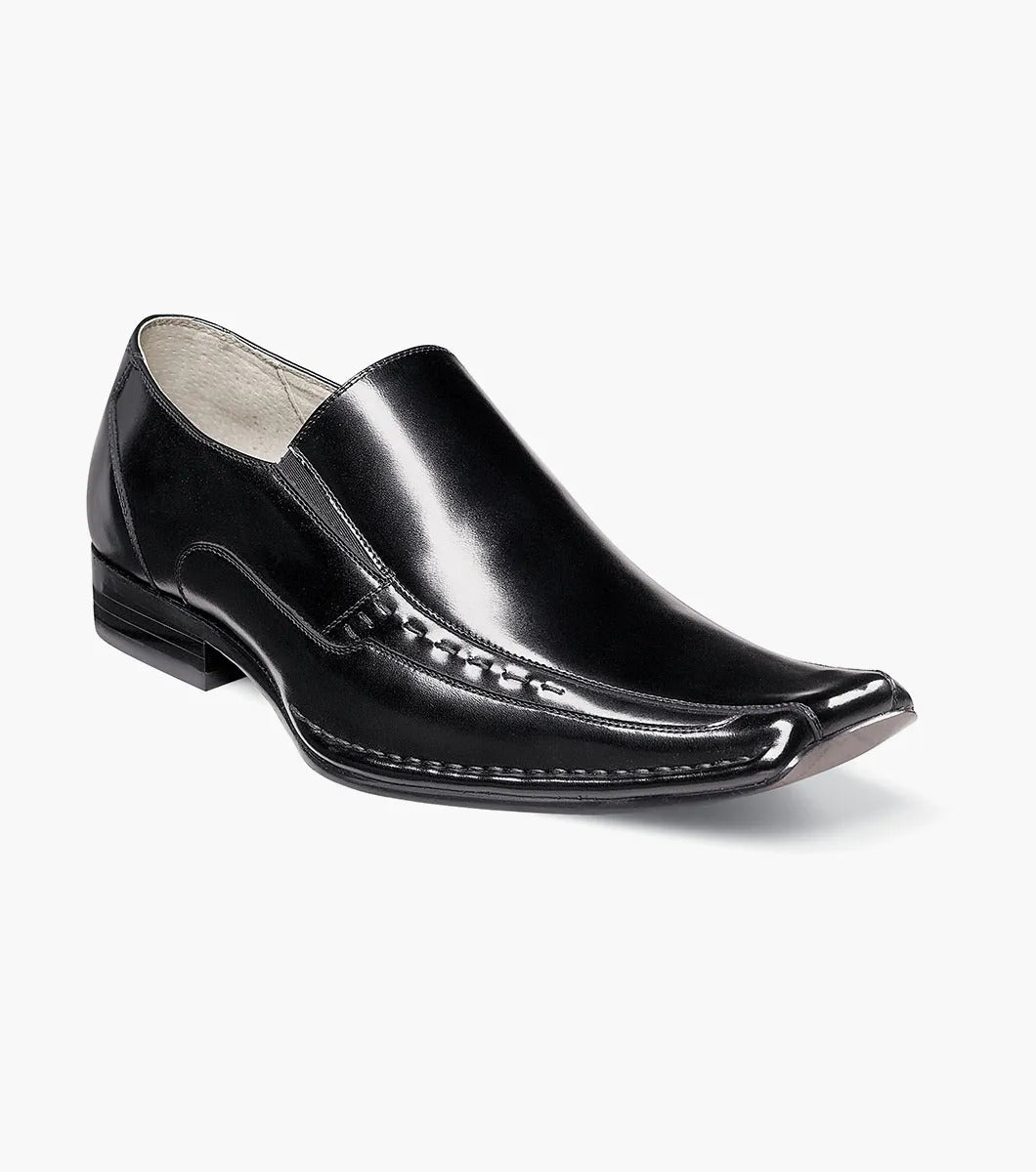 The Stacy Adams - TEMPLIN Bike Toe Loafer in black, designed by STACY ADAMS and identified with model number 24507-001, is a genuine leather shoe boasting a shiny finish and subtle stitching details. It features a cushioned insole for ultimate comfort and is showcased on a plain white background.