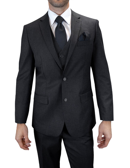 A person wearing the TS-2V-H.Charcoal modern fit men's suit from Statement Clothing, crafted from fine Italian wool, complemented by a white shirt and dark tie, is standing with arms relaxed at sides.