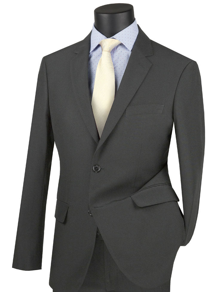 Displayed on the mannequin is a Vinci Suits medium gray ultra-slim fit single-breasted jacket, styled with a light blue polka-dot shirt and complemented by a cream-colored tie.