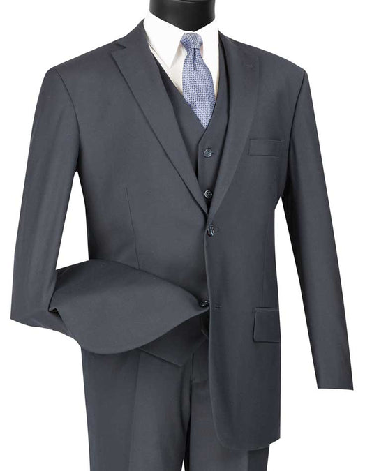 Displayed on a headless mannequin is the Vinci Regular Fit 3 Piece Suit 2 Button in Navy by Vinci Suits, complete with a matching jacket, vest, and trousers, and paired with a light blue tie.