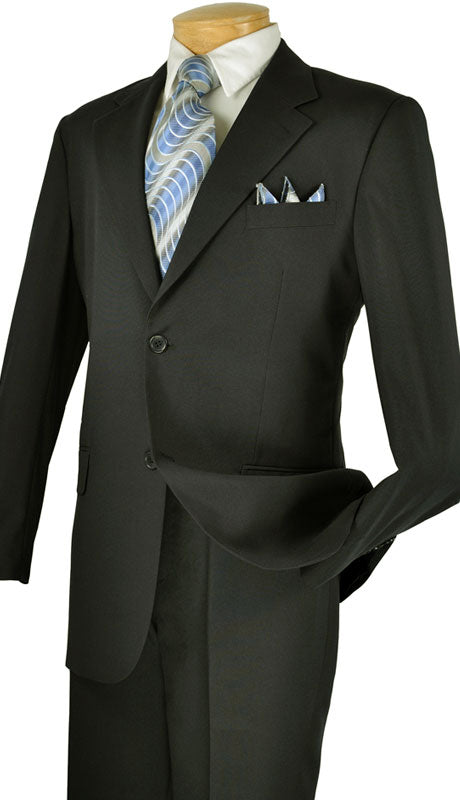 A Vinci Single Breasted Poplin Dacron Suit in black, featuring flat front pants, is elegantly paired with a light blue patterned tie and matching pocket square.