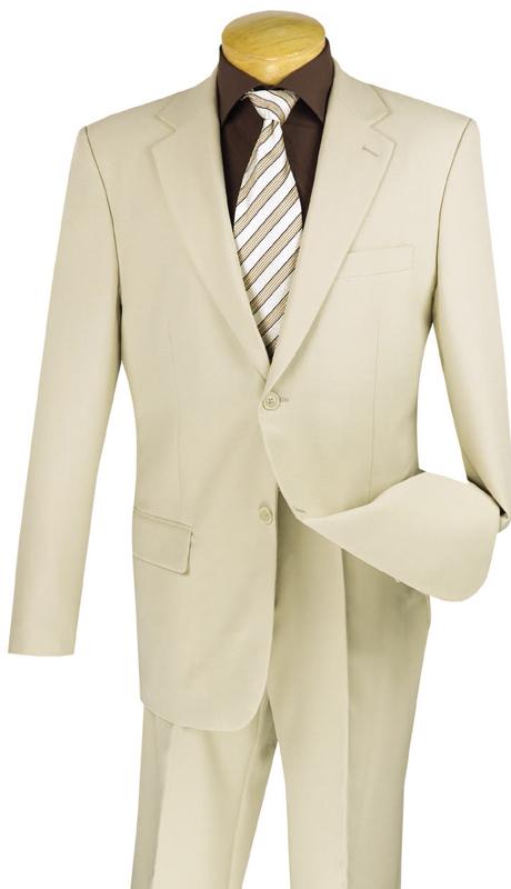 The mannequin is elegantly dressed in a Vinci Suits Single Breasted Poplin Dacron Suit in beige, complemented by a white and brown striped tie over a brown shirt. The look is completed with flat front pants for a sleek finish.