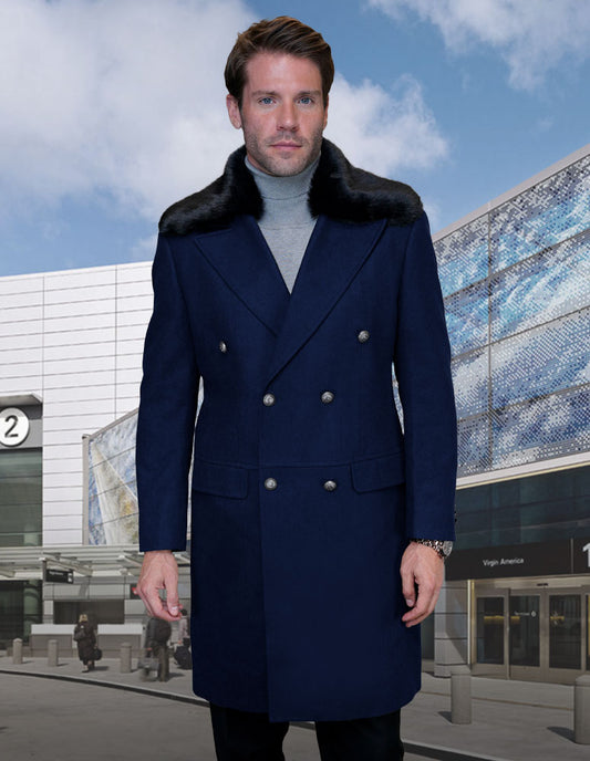 A man wearing the Statement Clothing | WJ-102-NAVY coat stands in front of a modern building with glass walls.