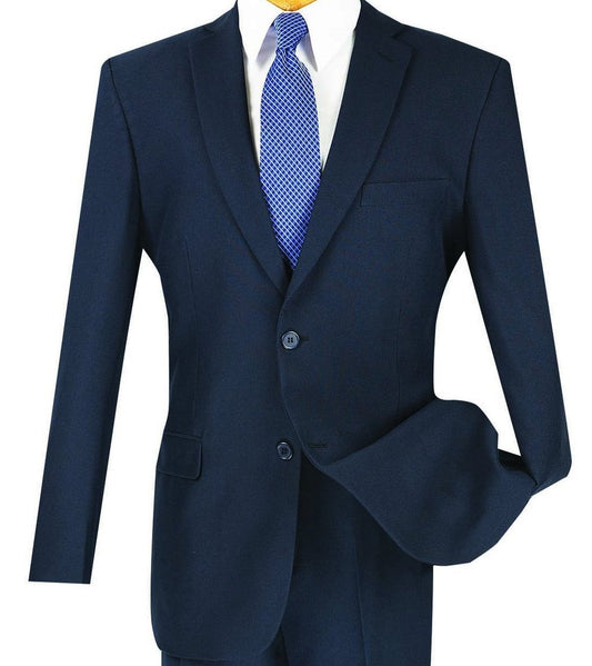 The Vinci Suits Regular Fit 2 Button Business Blazer in Navy (Model Z-2PP) is showcased with a matching waistcoat and pants. It includes a blue patterned tie and a crisp white shirt, making it an excellent option for any professional setting.