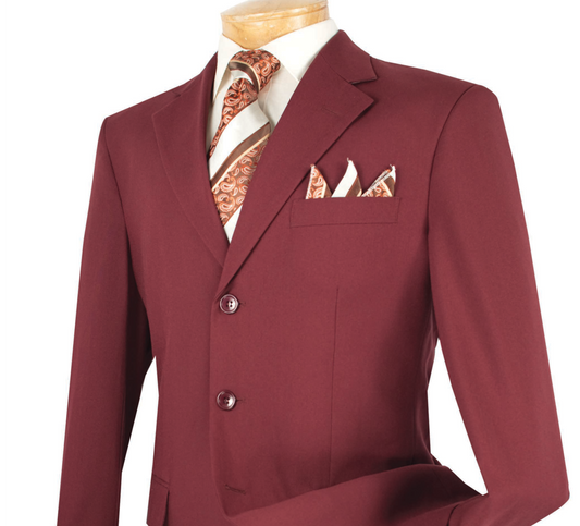 A mannequin dressed in the Vinci Suits' Vinci Regular Fit 3 Button Blazer (Burgundy) Z-3PP, complemented by a matching patterned tie and pocket square, highlighting wrinkle-resistant elegance.