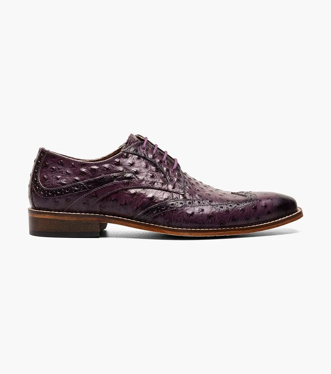 A plum Stacy Adams GENNARO Wingtip Oxford, skillfully crafted from genuine leather with an attractive ostrich quill print texture and featuring a low wooden heel.