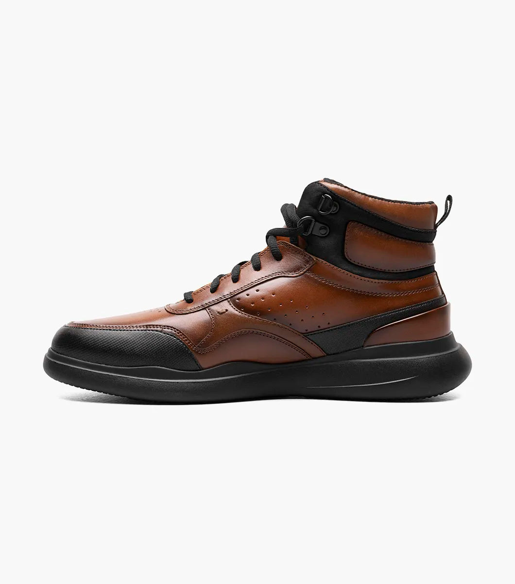 The Stacy Adams MAYSON U-Bal Lace Up Sneaker in Cognac features a brown and black high-top design with black laces and a sturdy yet lightweight EVA sole.