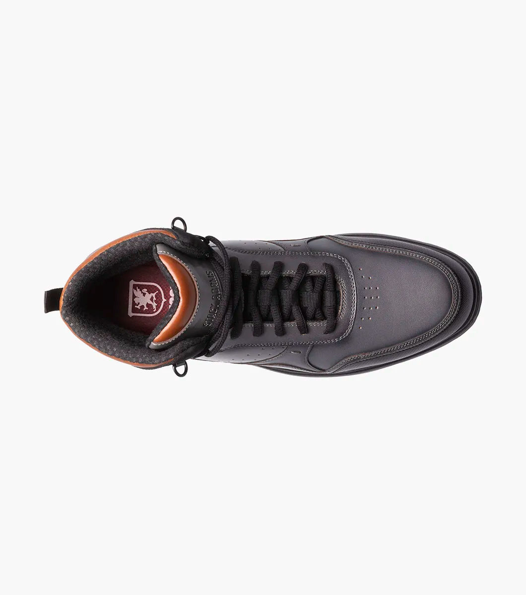 Introducing the Stacy Adams Mayson U-Bal Lace Up Sneaker in gray, featuring a high-top design with a premium leather upper, breathable perforations, and a cushioned EVA sole for enhanced comfort.