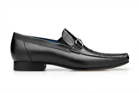 The Belvedere - Bruno genuine ostrich leg and Italian calf loafer dress shoe in black, featuring a textured top with silver buckle detail and a low heel, sits elegantly on a white background.